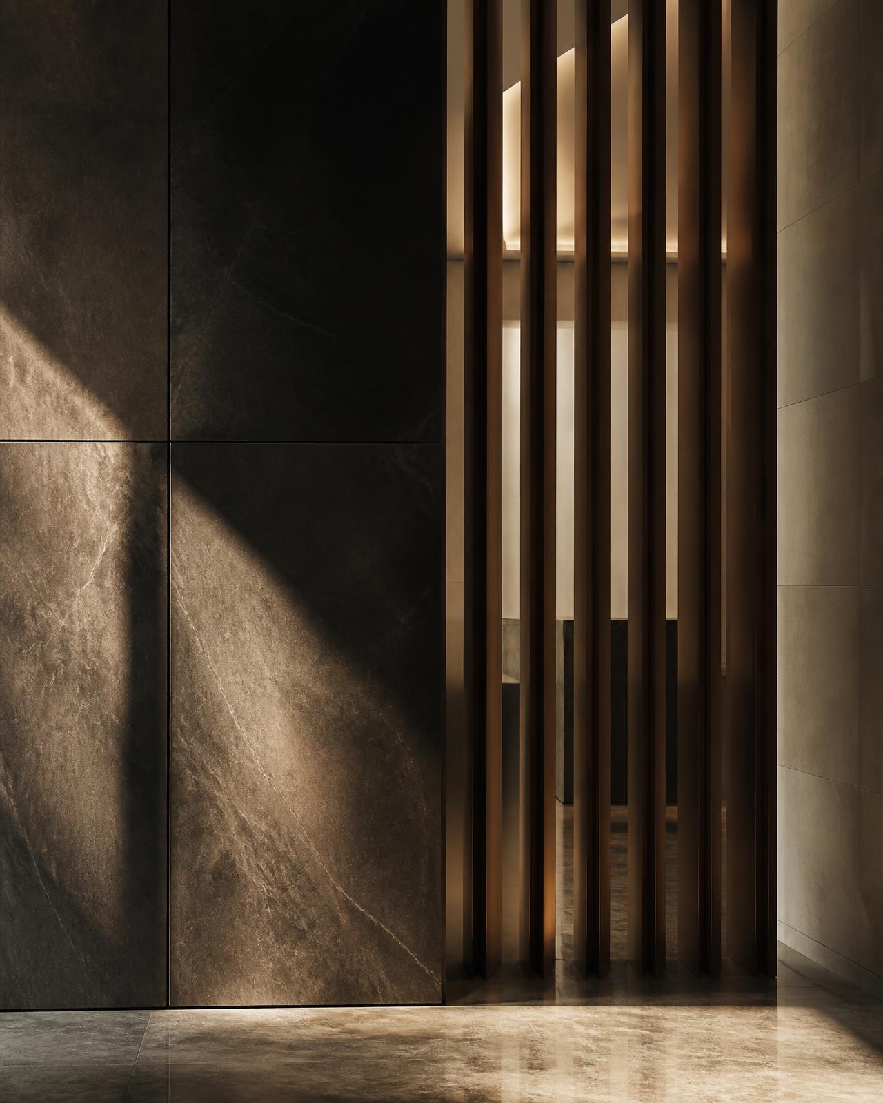 Stone and bronze detail of a private banking interior